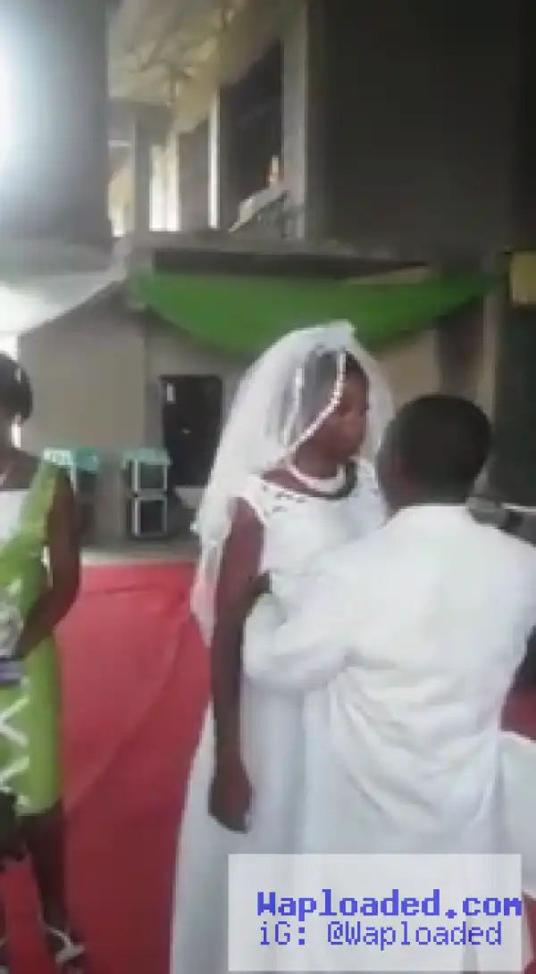 Bride pushes groom away as he was about to kiss her at the altar (photos)